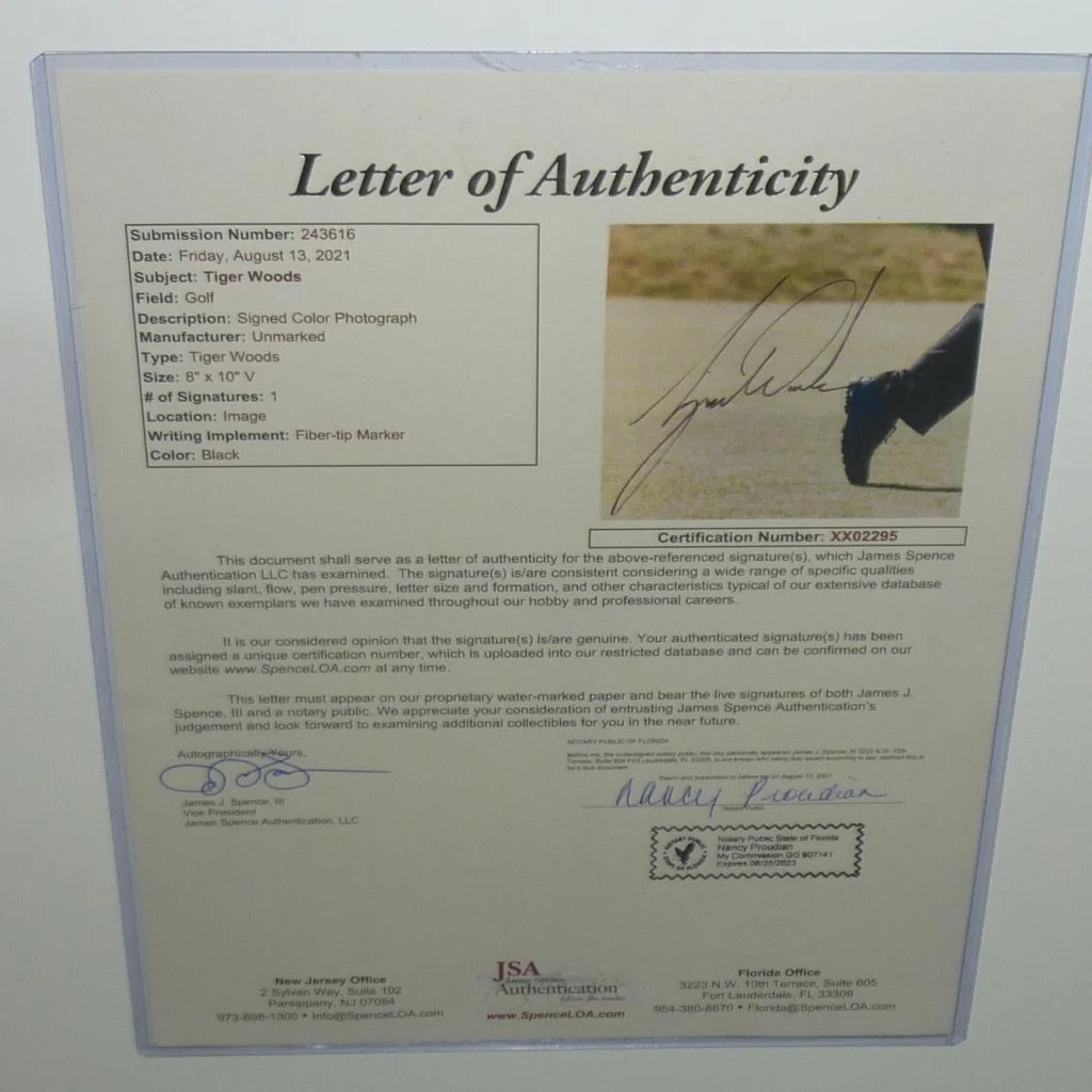 Framed Tiger Woods autographed 8x10 photo with JSA authenticity certificate for Masters golf poster