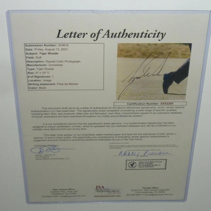 Framed Tiger Woods autographed 8x10 photo with JSA authenticity certificate for Masters golf poster