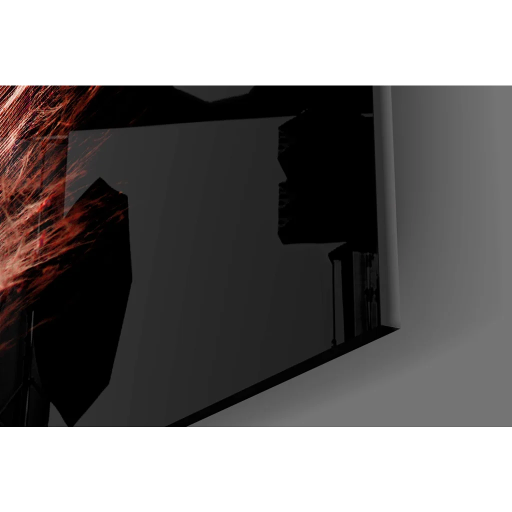 Rose gold feather glass wall art with black angular frame and red glowing fibers