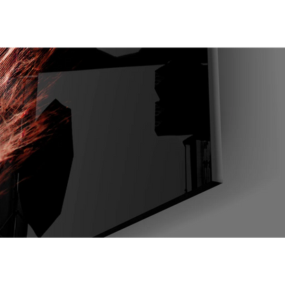 Rose gold feather glass wall art with black angular frame and red glowing fibers