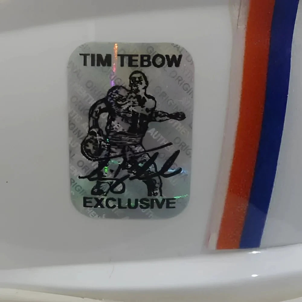 Tim Tebow autographed Gators mini helmet with silver hologram sticker