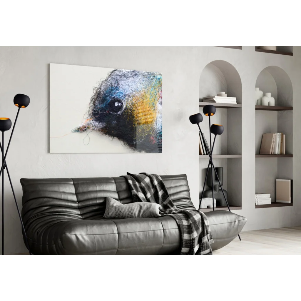 Abstract glass wall art of textured bird portrait in blue, yellow, black