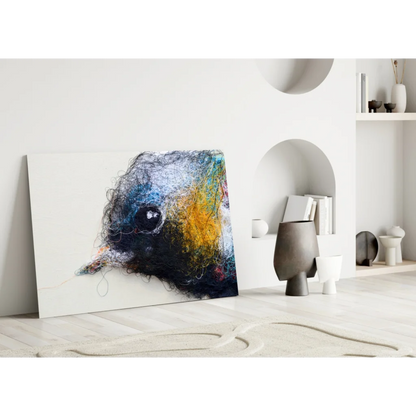Vibrant abstract glass wall art of birds head in black, blue, yellow threads