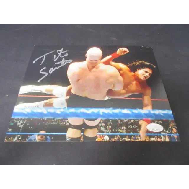 Autographed Tito Santana signed 8x10 photo of wrestlers in the ring JSA certified