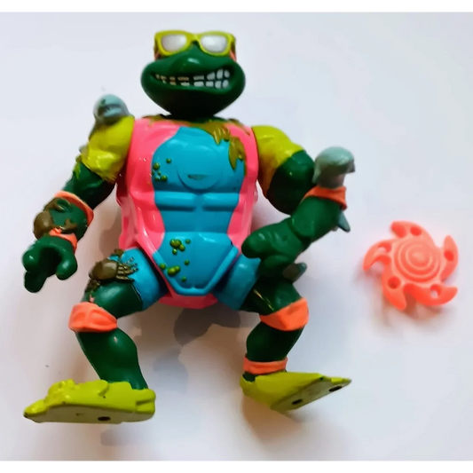 Vintage TMNT Action Figure Sewer Surfer Mike with colorful shell and wheel