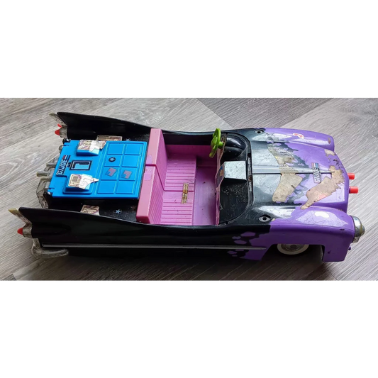 Vintage 1989 TMNT Vehicle Foot Cruiser toy with purple and black exterior, pink interior