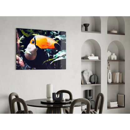 Vibrant orange and black toucan wall art canvas on white wall