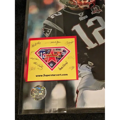 Signed Tom Brady Patriots jersey with Super Star Certification and Ray Lewis signed 8x10 photo