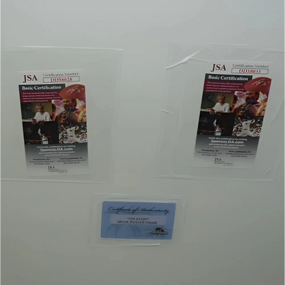 Clear JSA-certified Tom Hanks Toy Story movie poster autograph holder