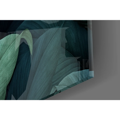 Tropical toucan glass wall art with teal green leaves and orange beak