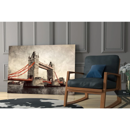 Sepia-toned Tower Bridge canvas wall art with red cables on textured surface