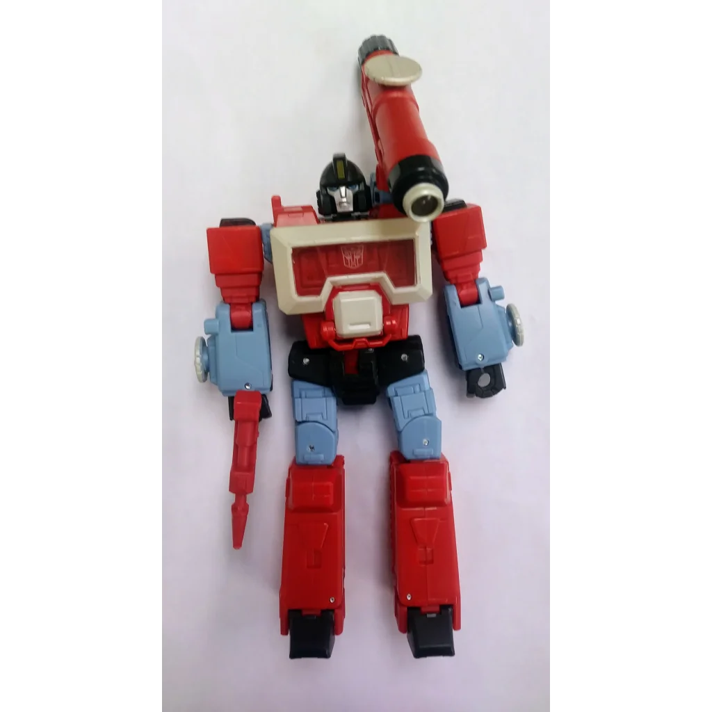 Red and blue Transformers action figure Autobot Perceptor with yellow faceplate