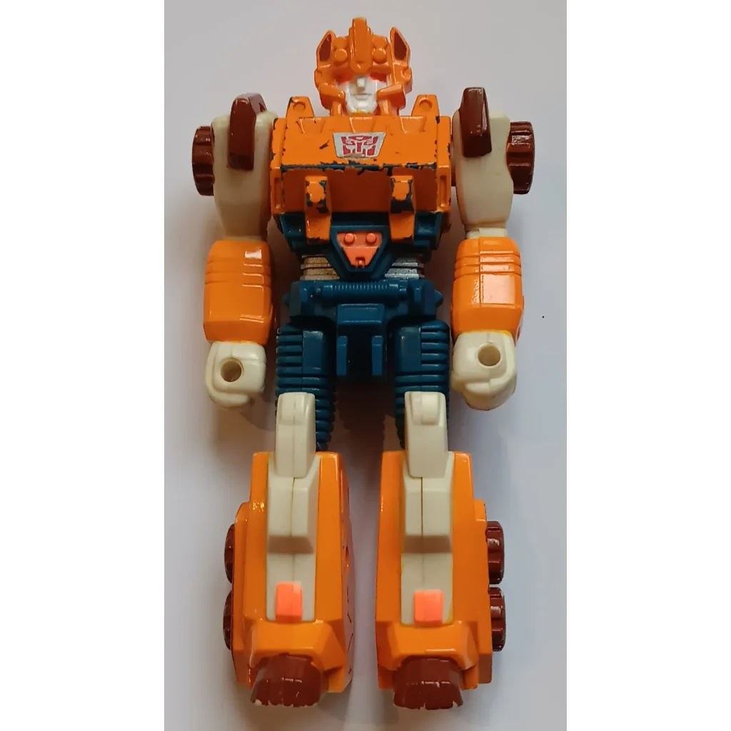 Vintage 1990 Transformers action figure Autobot Rollout Hasbro orange white