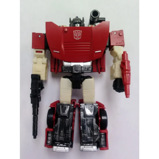 Red and white Transformers action figure Autobot Sideswipe with black accents