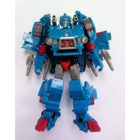 Blue and red Autobot Skids Transformers action figure, 30th anniversary edition