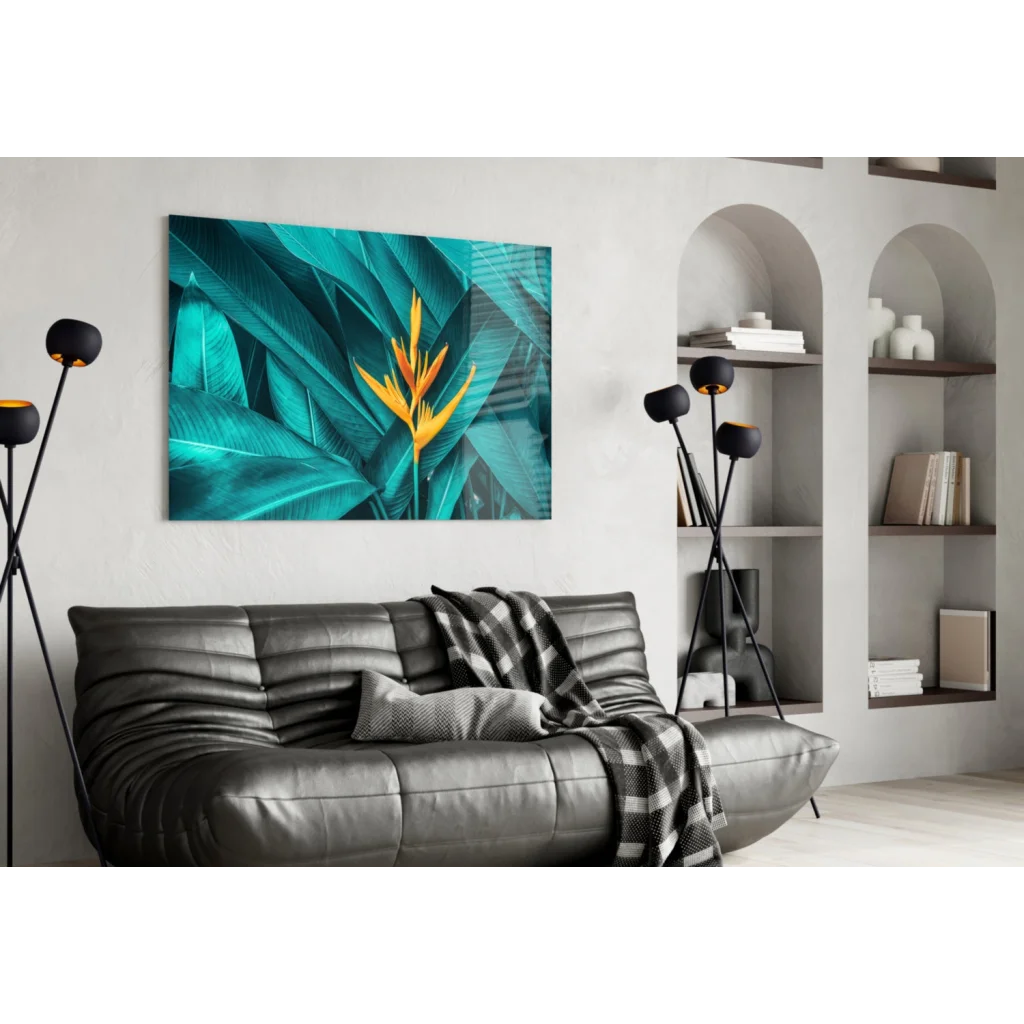Vibrant teal and yellow glass wall art of bird of paradise in modern living room