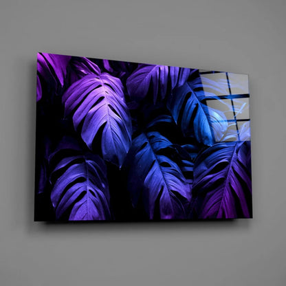 Vibrant purple monstera glass wall art with glossy reflective surface