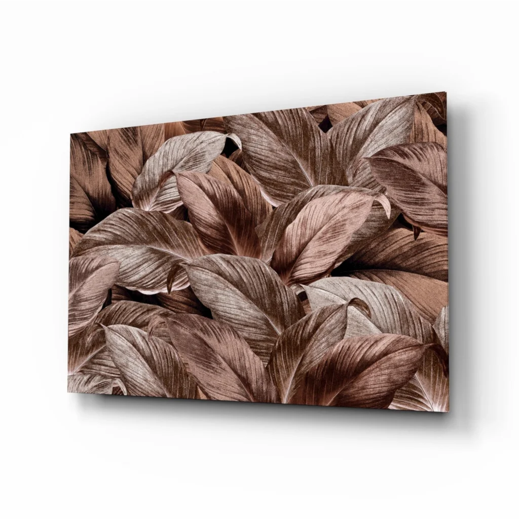 Tropical leaf glass wall art with metallic bronze shimmer on canvas