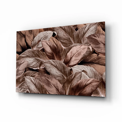 Tropical leaf glass wall art with metallic bronze shimmer on canvas