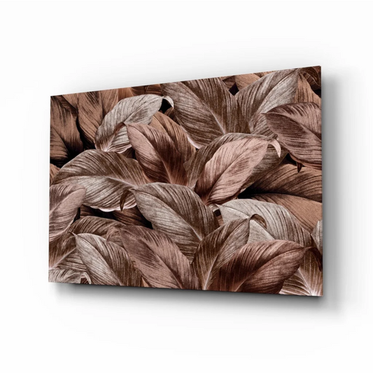 Tropical leaf glass wall art with metallic bronze shimmer on canvas