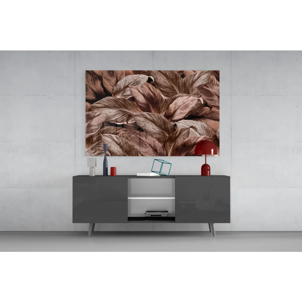 Close-up brown beige feathers on glass wall art with bronze shimmer