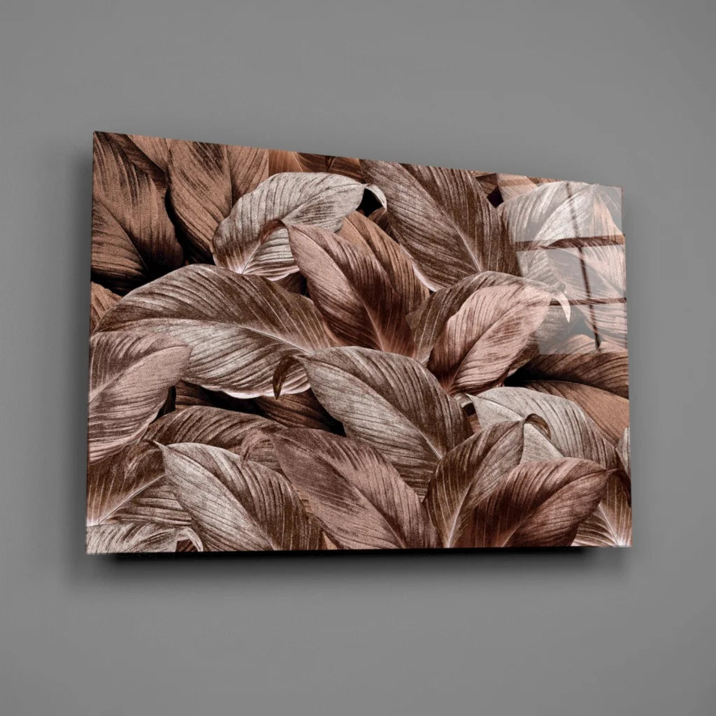 Tropical leaf glass wall art with metallic bronze shimmer
