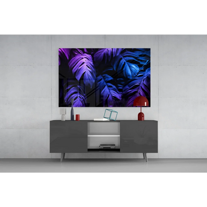 Vibrant purple monstera glass wall art on sleek gray console