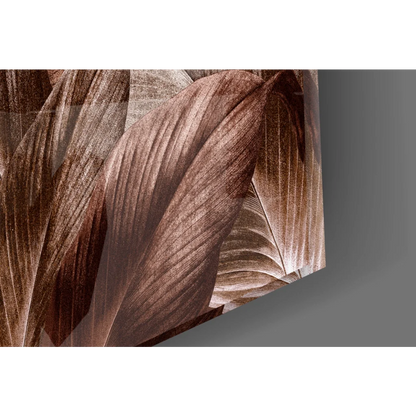 Modern tropical leaf glass wall art in bronze shimmer