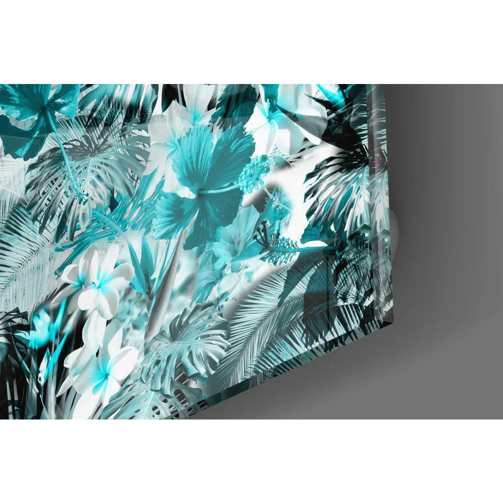 Vibrant teal hibiscus glass wall art with palm fronds in modern style