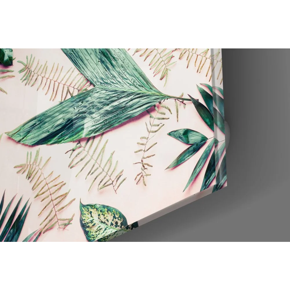 Vibrant tropical leaf tempered glass art in pink and green