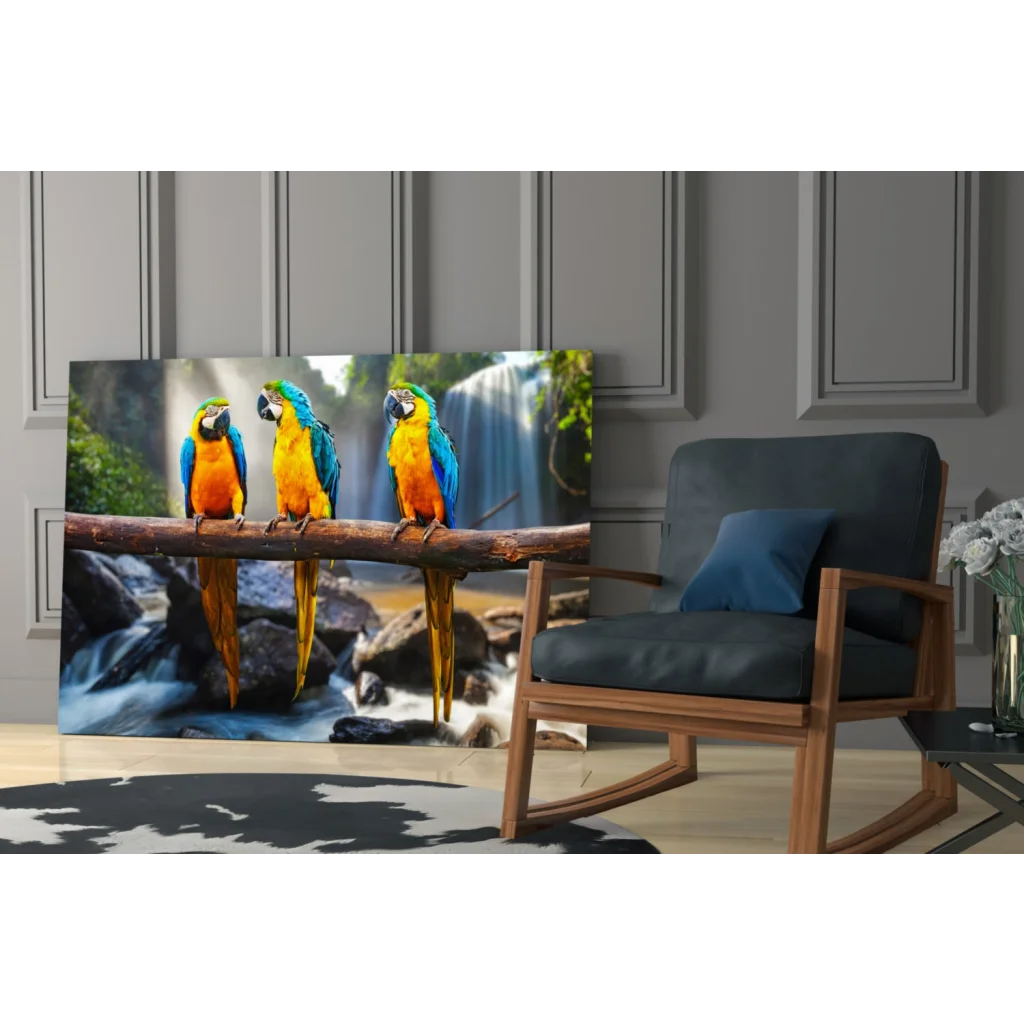 Vibrant blue and yellow macaws on branch by waterfall, canvas wall art