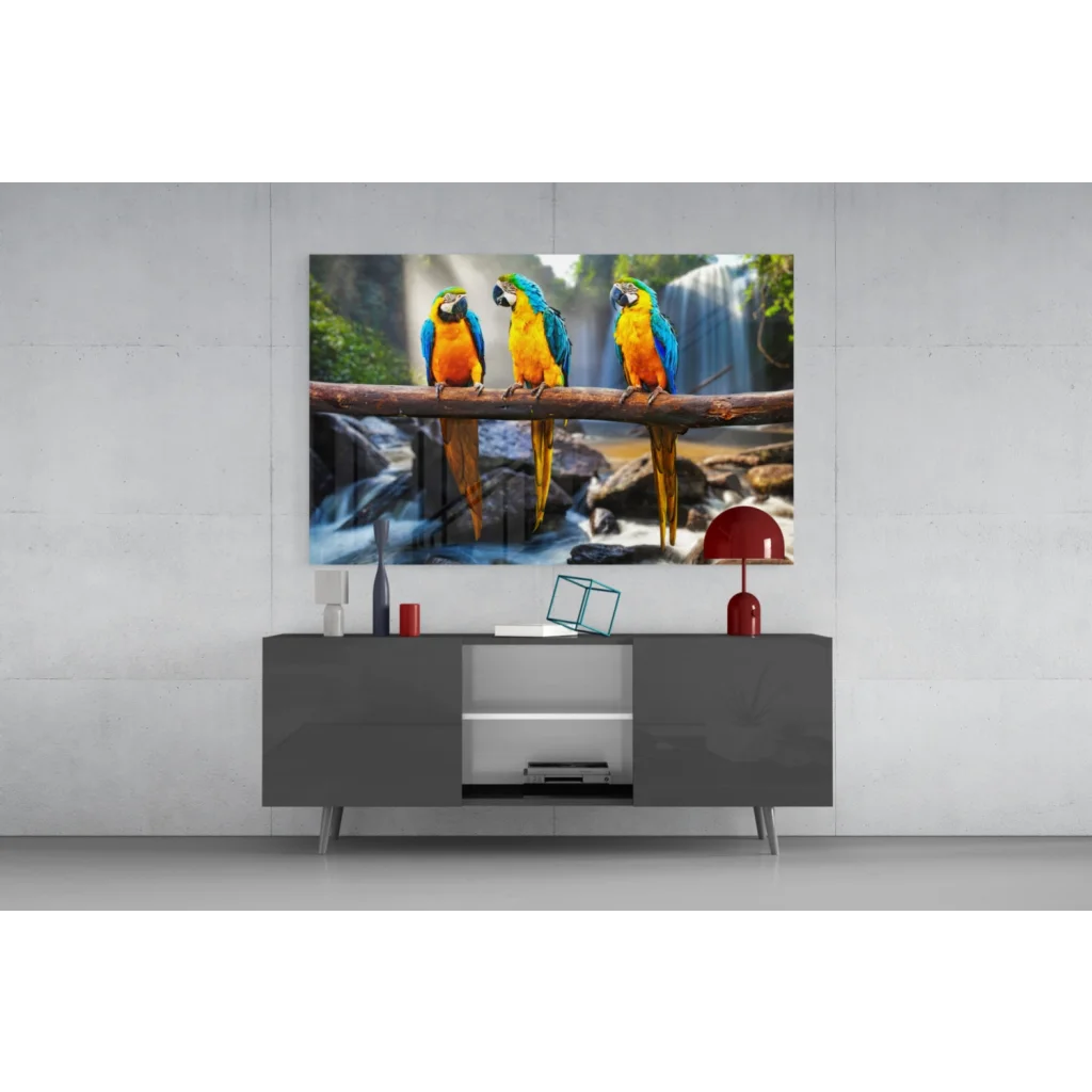 Vibrant blue yellow green macaw wall art canvas print over waterfall