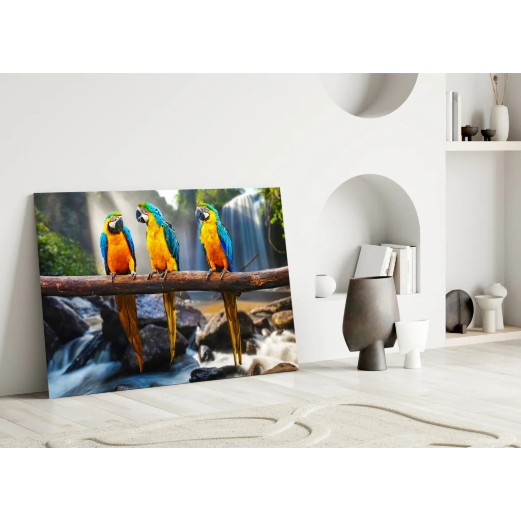Vibrant blue and yellow macaws on branch canvas wall art