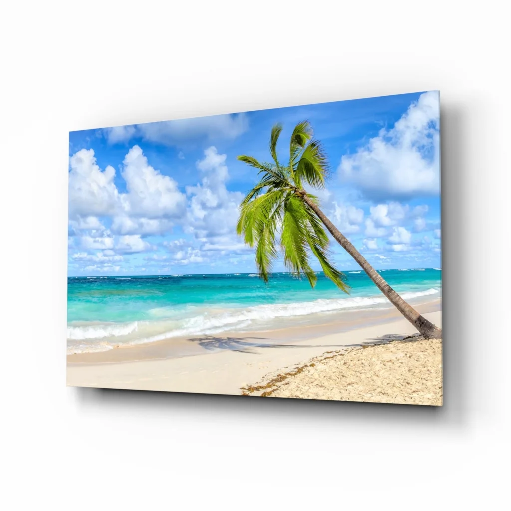 Leaning palm tree in turquoise waters on tropical paradise glass wall art