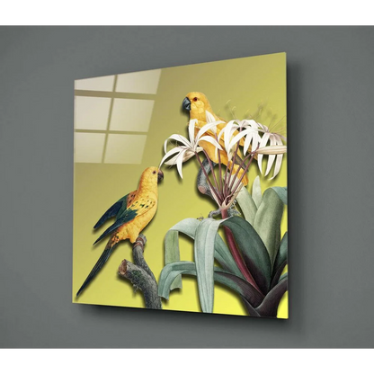 Vibrant yellow parrots on glass wall art with lush jungle foliage