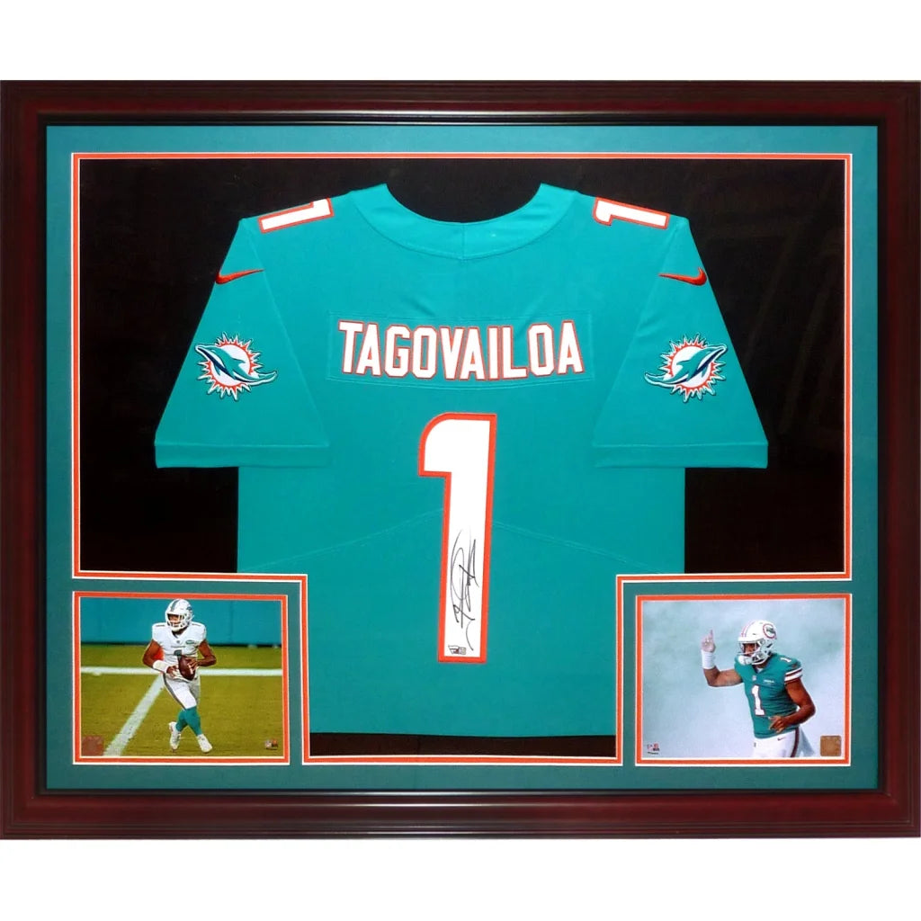 Tua Tagovailoa autographed Miami Dolphins teal jersey in dark wood frame