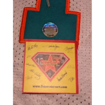 Hang tag with hologram and website on Tua Tagovailoa Miami Dolphins autographed jersey