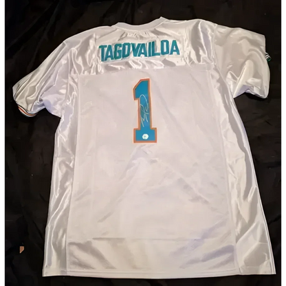 White Tua Tagovailoa Miami Dolphins autographed jersey with signature and COA