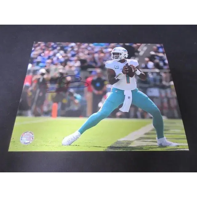 Autographed Tua Tagovailoa signed 8x10 photo of Miami Dolphins player in white and teal