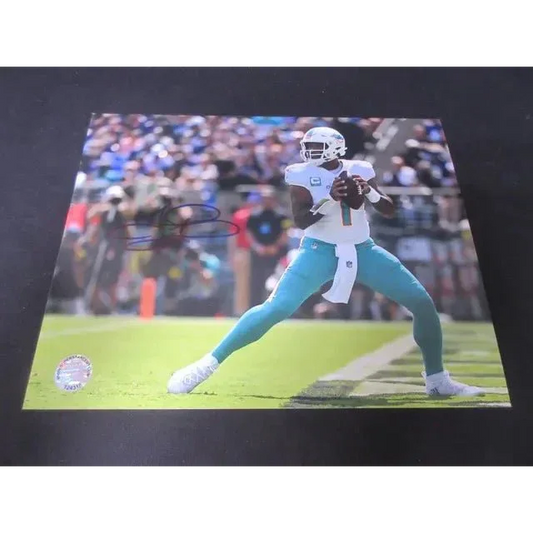Autographed Tua Tagovailoa signed 8x10 photo of Miami Dolphins player in white and teal