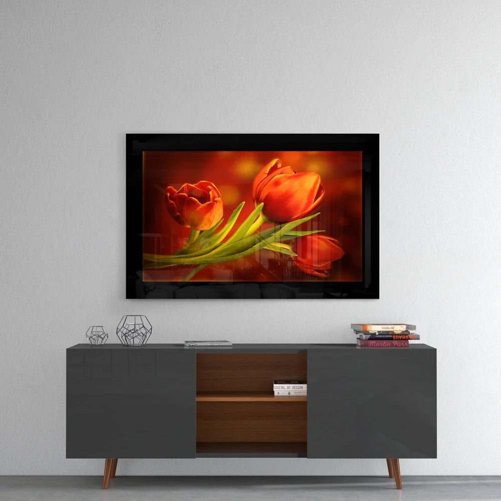 Vibrant orange tulips in sleek black frame glass wall art