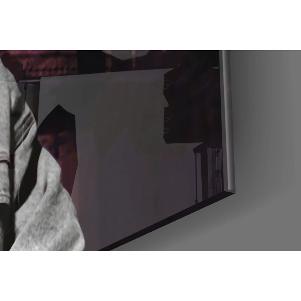 Sleek silver-framed monitor showing 2Pac purple cityscape glass wall art