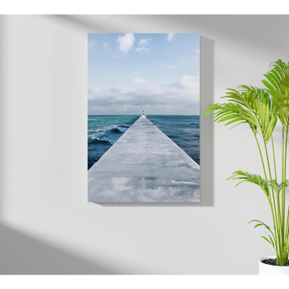 Gray pier extending into turquoise ocean on canvas print