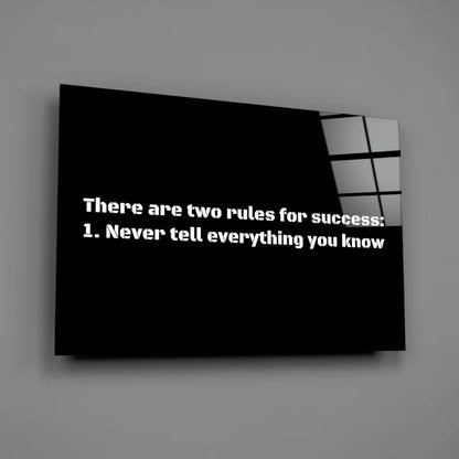 Black canvas wall art with bold white text: Success rules 1