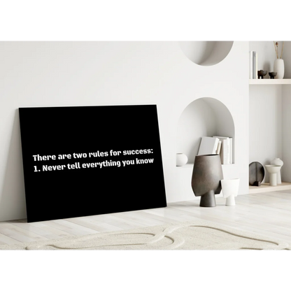 Black canvas wall art with white text: there are two rules for success 1