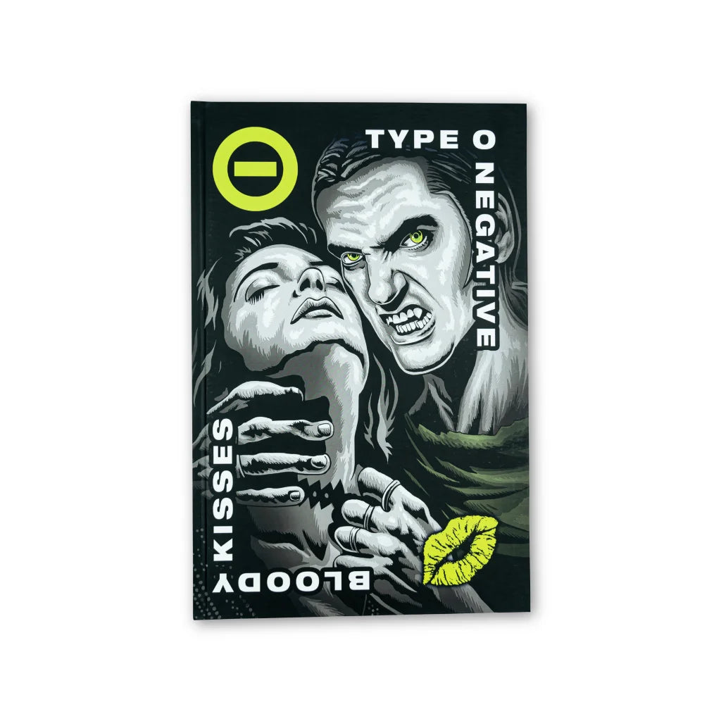 Black hardcover notebook featuring a vampire and woman illustration with type o negative bloody kisses text and neon yellow accents