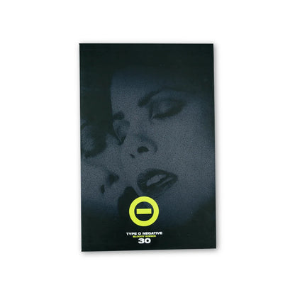 Black album cover of type o negative bloody kisses deluxe bundle featuring moody portrait with yellow circular logo