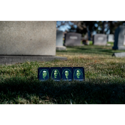 Four framed portraits of men with long hair from the Type O Negative trading card set