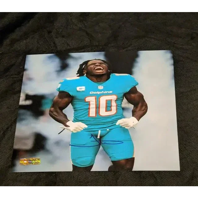 Tyreek Hill autographed 8x10 photo in Miami Dolphins uniform, certified authentic NFL memorabilia