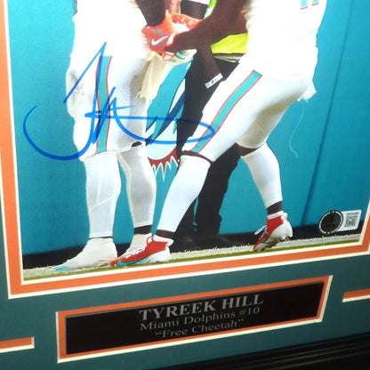 Tyreek Hill autographed Miami Dolphins framed photo with blue signature